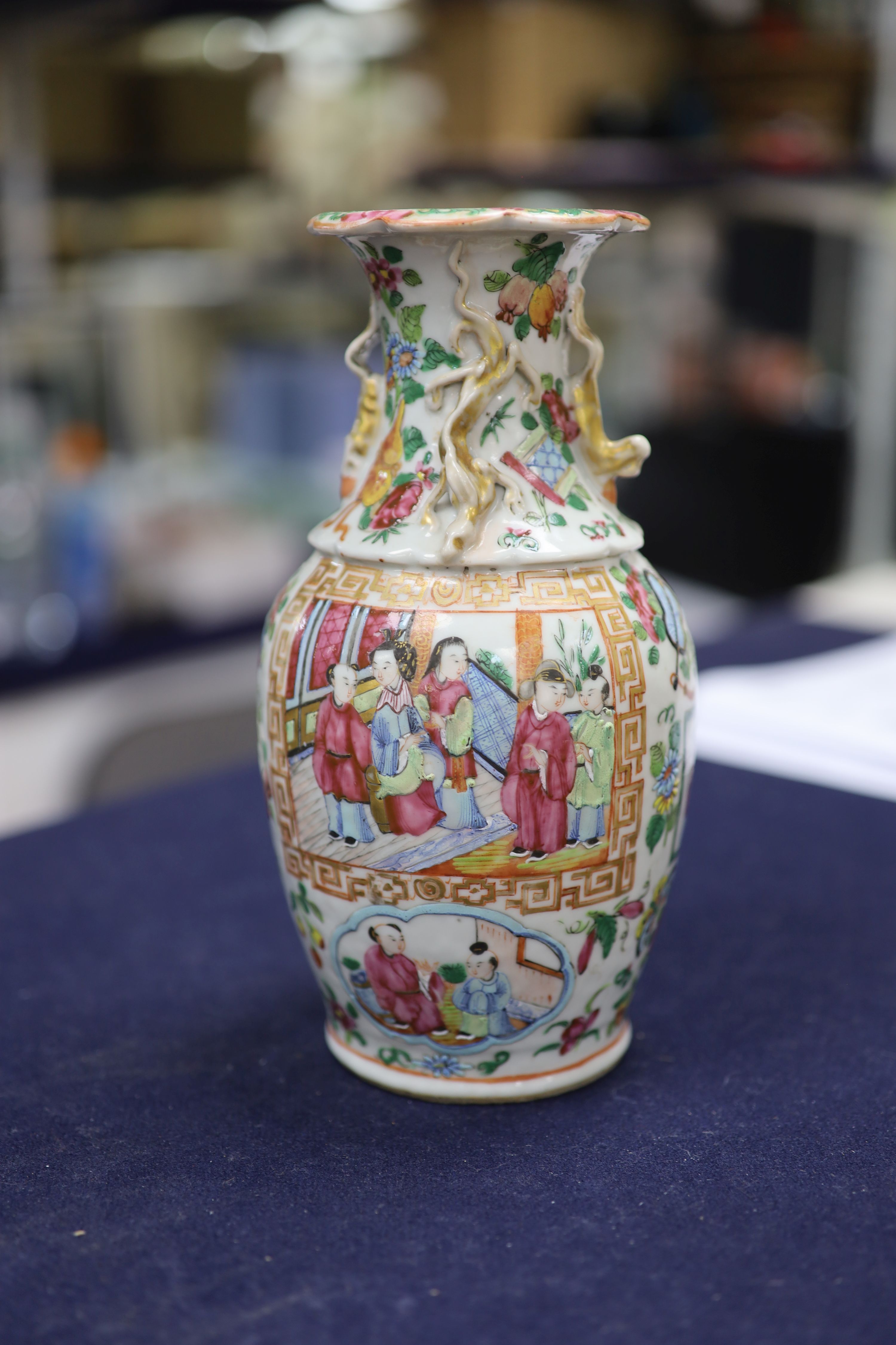 A Chinese famille verte jar and cover and a Canton famille rose vase, tallest 22cm